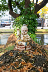 Thai religious figurine in the park