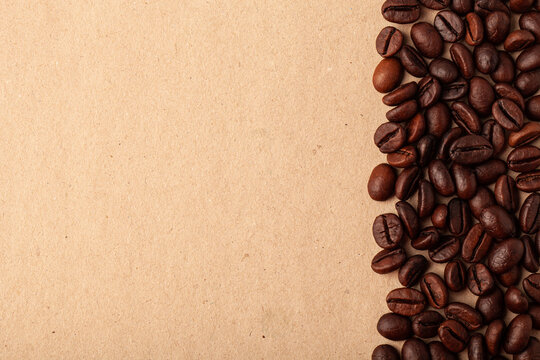 Roasted coffee beans on the light background for wallpaper or decor. Toned © strannik_fox