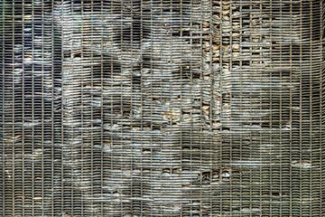 Close-up view of old car radiator honeycomb background texture, damage combustion engine cooling...