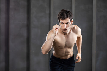 Obraz premium Perfect man body on black background.