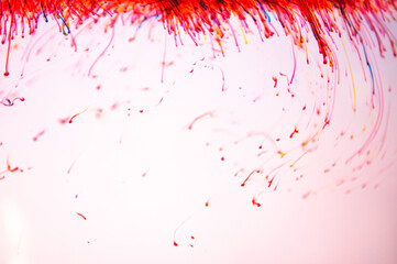 Red paint dissolves in liquid, process