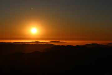 Sunset over mountains.