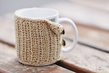 cup of coffee on wooden table