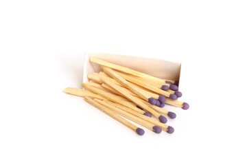 Purple matches in a box on a white background isolated