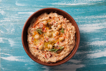 vegan food. hummus with sun dried tomatoes and smoked paprika
