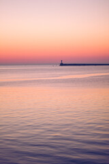 evening sunset on the Black Sea coast on the seaside boulevard of the hero city.