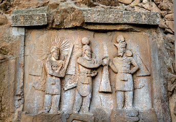 Taq-e Bostan is a site with a series of large rock relief from the era of Sassanid Empire of Persia, from 226 to 650 AD.