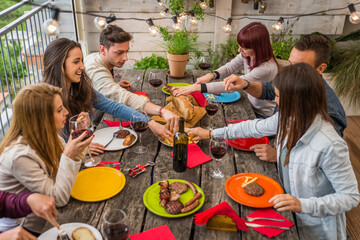 Friends having lunch at home