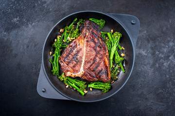 Modern style traditional barbecue dry aged wagyu porterhouse beef steak bistecca alla Fiorentina...