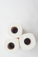 rolls of paper towels, napkins on a white background. White on white, pulp, paper, hygiene. The concept of conscious consumption, sustainable lifestyle. High quality photo