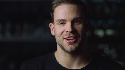 Obraz premium Portrait of young handsome bearded man looking at camera.Guy interviewing.