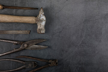 International Worker's day concept. Labor Day background. Set of different tools on grunge background. Copy space. Flat lay.