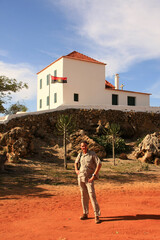 Tourist standing in front of the National Museum of Slavery in Luanda, Angola West Africa