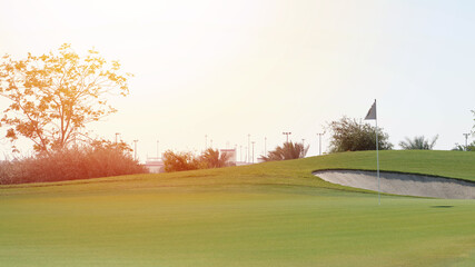 Golf flag at the beautiful golf course.