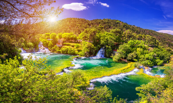 Waterfalls Krka, National Park, Dalmatia, Croatia. View of Krka National Park, Roski Slap location, Croatia, Europe. Beautiful world of Mediterranean countries. Traveling concept background.