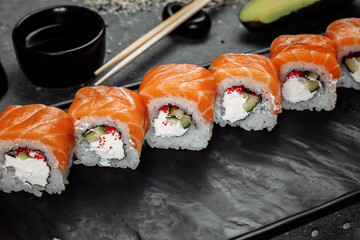 Sushi Philadelphia on a stone decorative plate