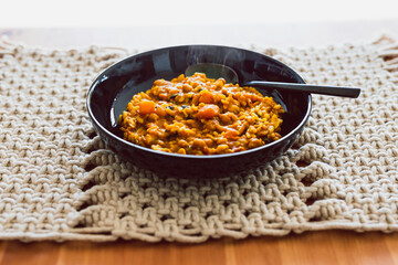 vegan pumpkin risotto with almond and spinach, healthy plant-based food