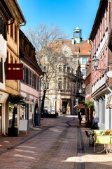 Fototapeta na wymiar Narrow street in the old town of Neustadt an der Weinstrasse in the Pfalz, Germany