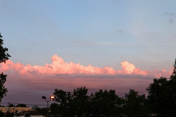Beautiful, fluffy, pink clouds at sunset