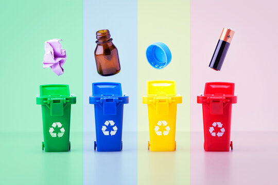 Plastic containers for garbage of different types. Colorful recycle bins. Recycling concept.