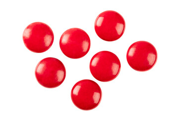 Red pills isolated on white background.