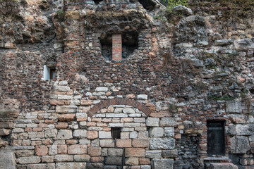 Verona, Italy, 07.04.2019: view of old ruined building in details, stone pattern