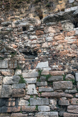 Verona, Italy, 07.04.2019: view of old ruined building in details, stone pattern