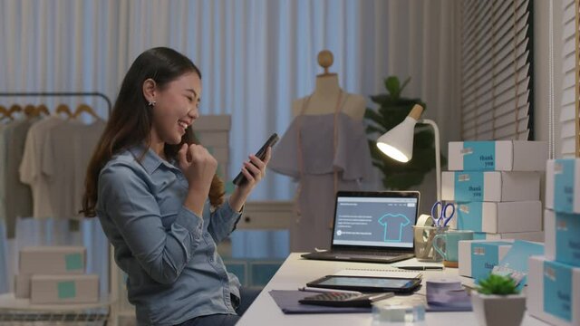 Young attractive beautiful female entrepreneur fund borrower crazy joyful ecstatic face gesture hand yes feeling amazed in peer to peer P2P lending finance or crowdfunding network microfinance approve