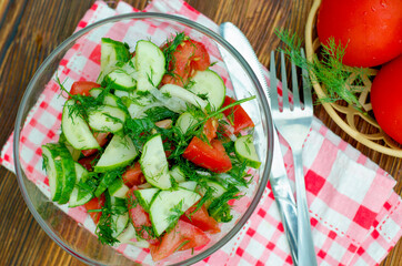 Salad with fresh tomatoes and cucumbers