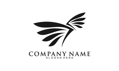 Flying bird wings beauty logo vector