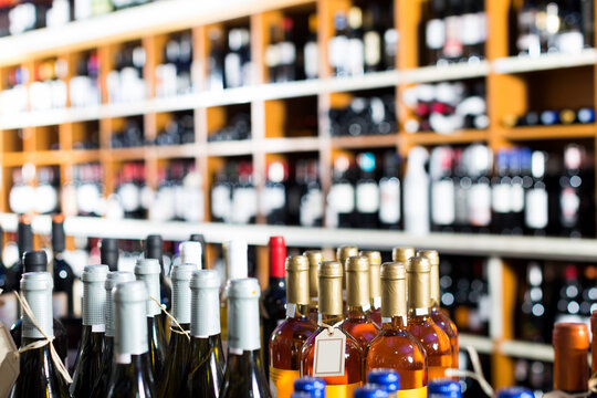 assortment of wine bottle in retail wine house.