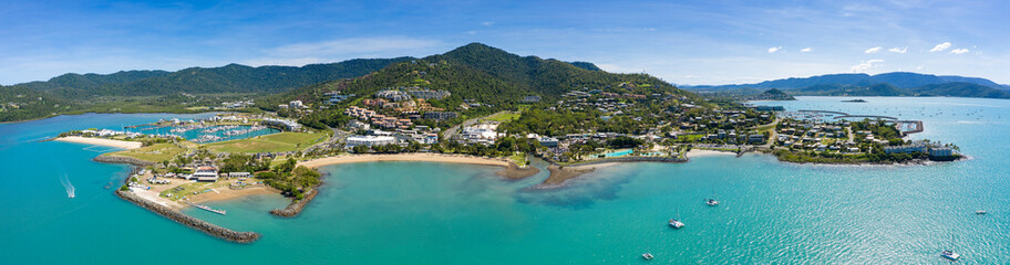 Aerial panoramic afternoon view of beautiful Airlie Beach in Queensland Australia, a popular...