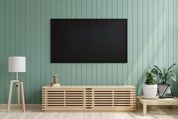 TV on the green wooden wall in the living room Decorated with wooden cabinets The lanterns and trees on the ground.3d rendering.