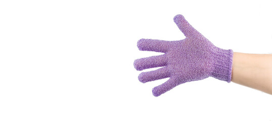 Hand with exfoliating massage glove for shower