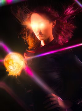 This Image Shows A Powerful Young Woman Holding A Glowing Crypto Currency Bitcoin In Her Palm As Her Eyes Beam Lasers Into A Dark Room. 