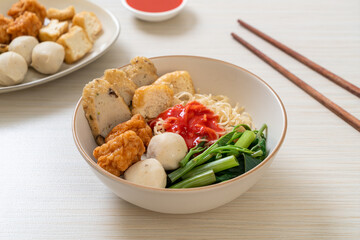 egg noodles with fish balls and shrimp balls in pink sauce, Yen Ta Four or Yen Ta Fo