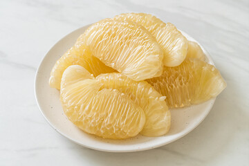 Fresh peeled pomelo, grapefruit or shaddock