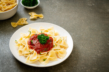 farfalle pasta in tomato sauce with parsley