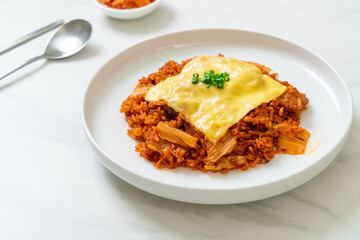 kimchi fried rice with pork and topped cheese