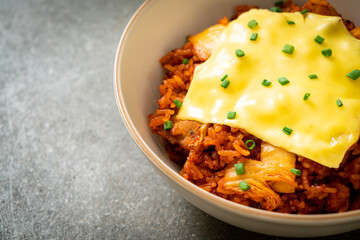 kimchi fried rice with pork and topped cheese