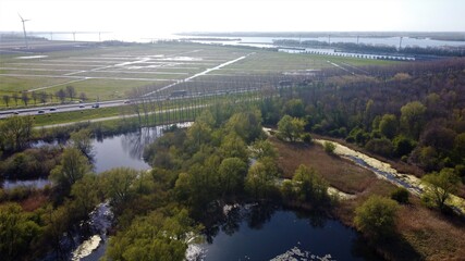 Beautiful piece of nature located between roads. Small lake and afforestation of untouched nature....