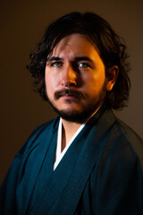 Obraz premium Photo of a young man wearing a Japanese silk kimono in Japan