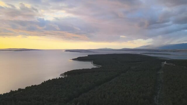 Romantic sunset over Adriatic, panoramic aerial shot in Vrsi Mulo, Zadar region.