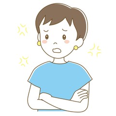 腕を組んでイライラするショートヘアの女性