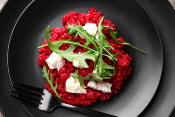 Plate with tasty beet risotto, closeup