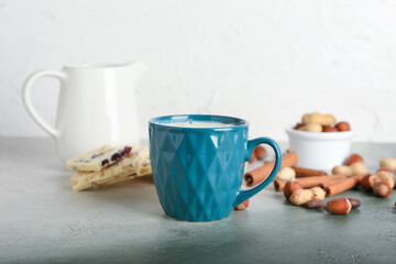 Obraz na płótnie Canvas Cup with hot white chocolate on table