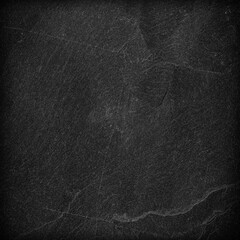 Dark grey black slate background or texture.