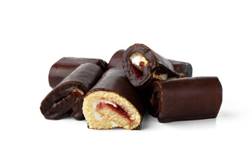 Chocolate glazed cake rolls with berry jam isolated on white background.