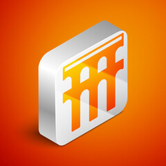 Isometric Aqueduct of Segovia, Spain icon isolated on orange background. Roman Aqueduct building. National symbol of Spain. Silver square button. Vector