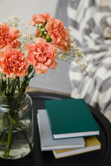 Bouquet of beautiful carnation flowers on table in room